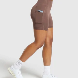 PANTALONES CORTOS CON BOLSILLO MUJER GYMSHARK